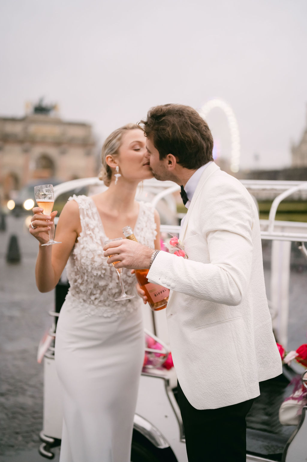 Parisian bride and groom toasting rose 