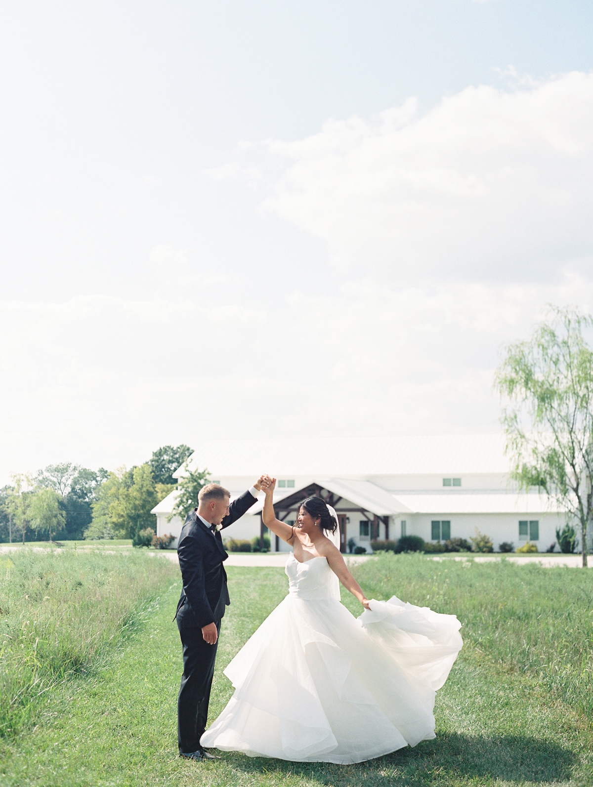 white farm house wedding with ballgown