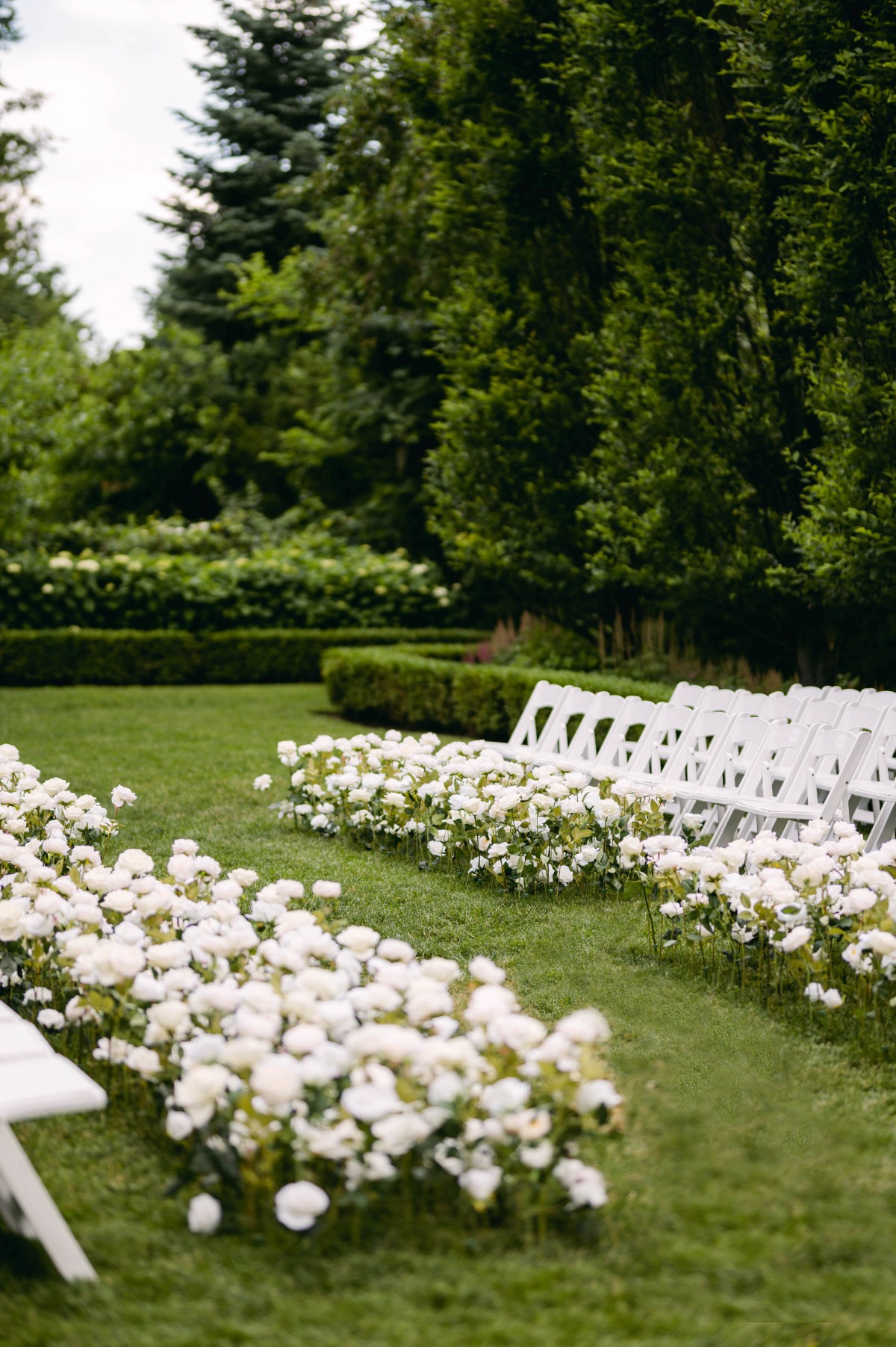 White and green wedding ceremony flowers