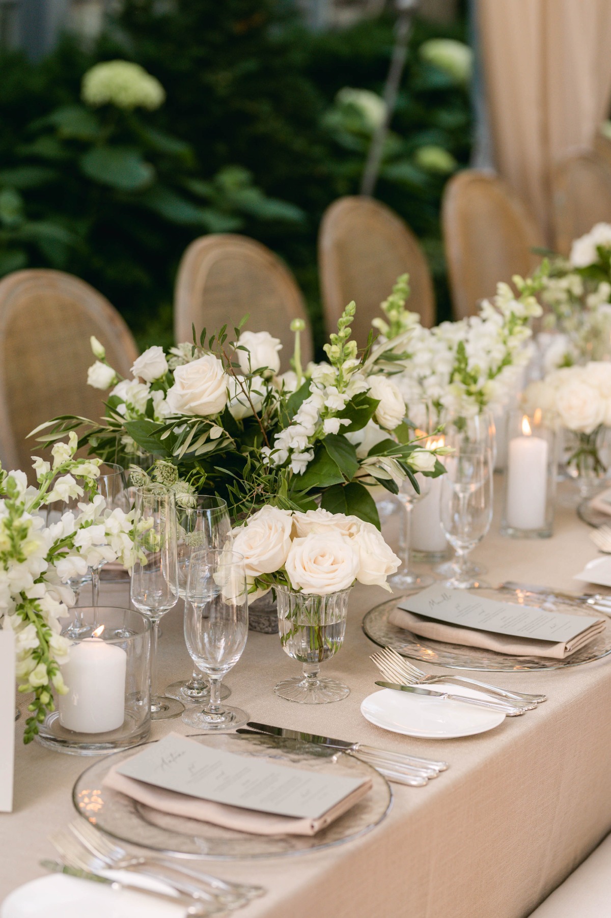Neutral pink and white reception table