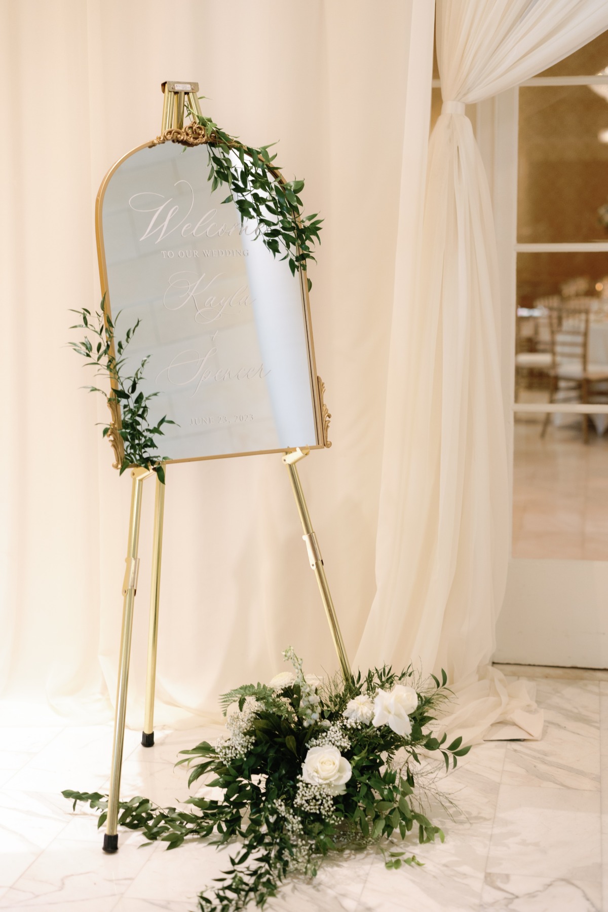 gold-rimmed welcome mirror
