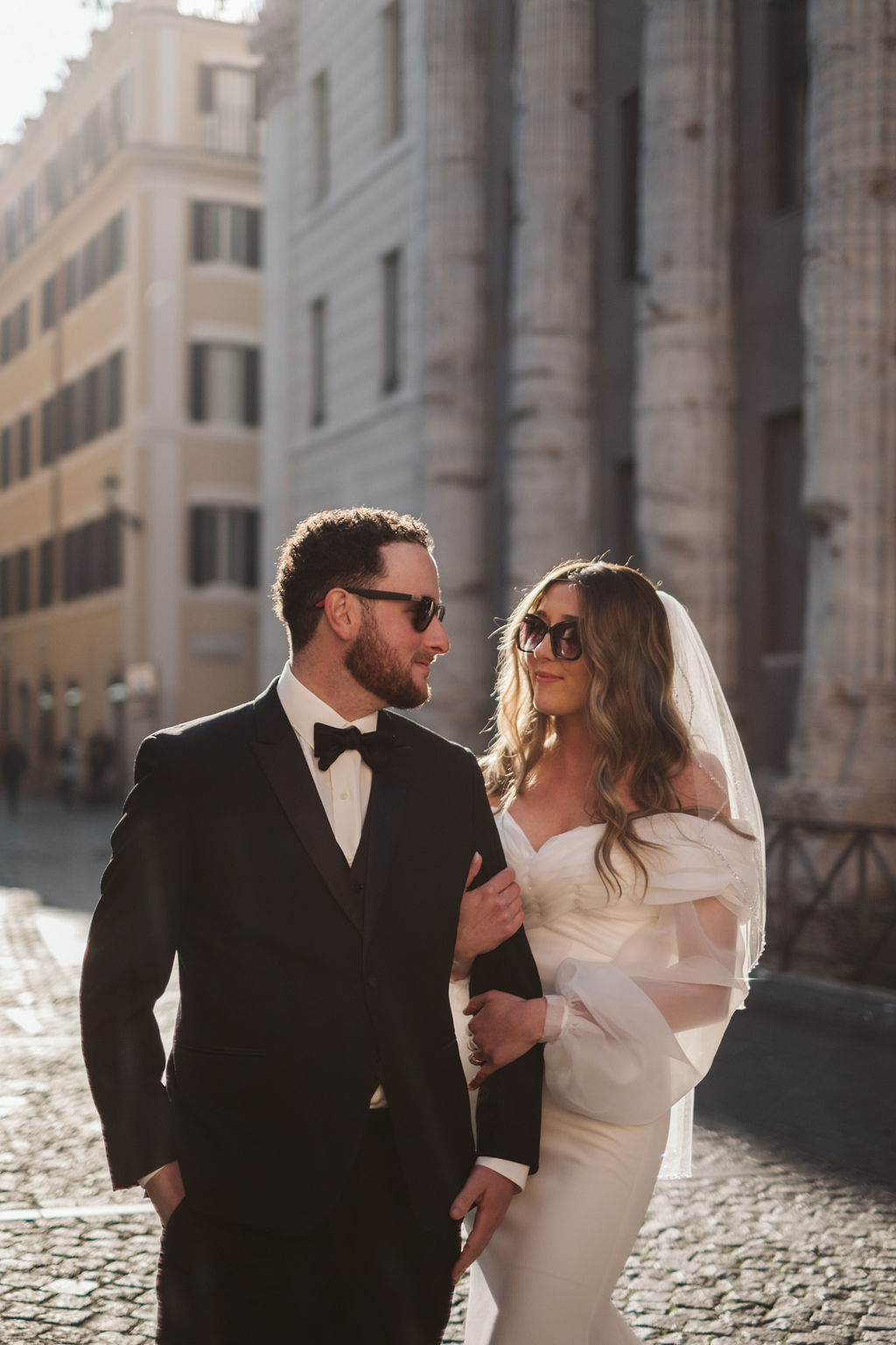 Stylish Italian elopement couple in sunglasses