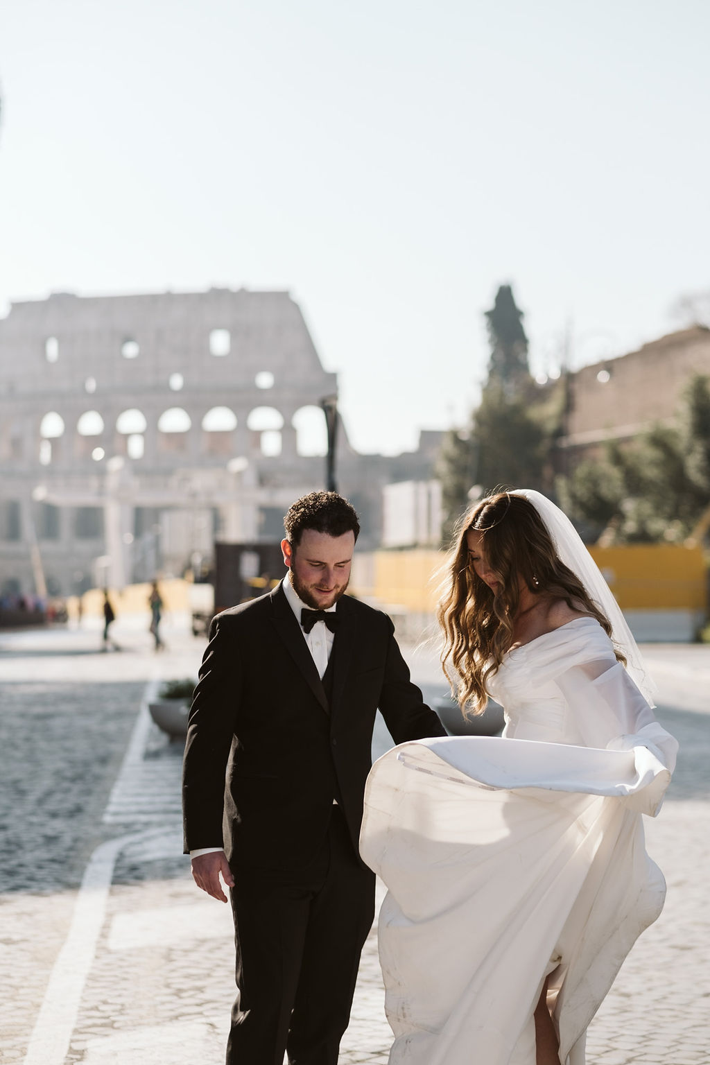 Italian bride twirling in wedding dress