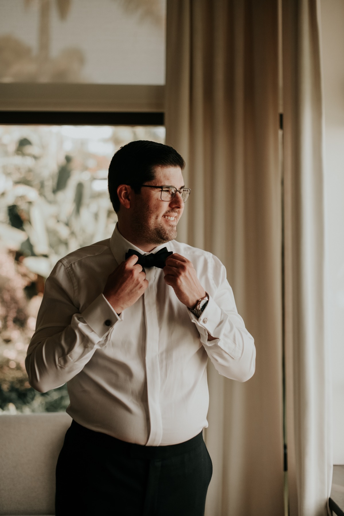 classic black tie look for groom