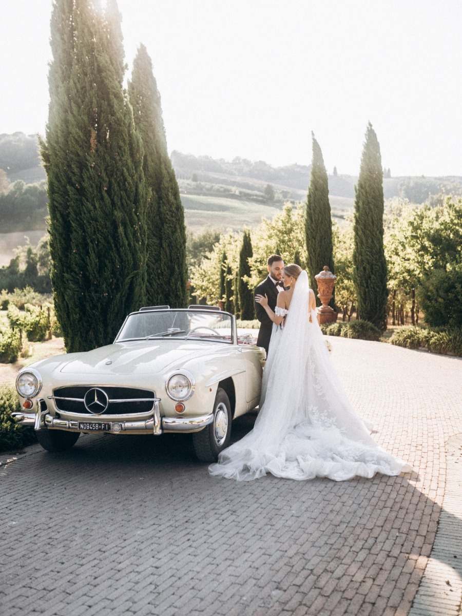 A thousand lights greeted guests in the garden at this Tuscan wedding