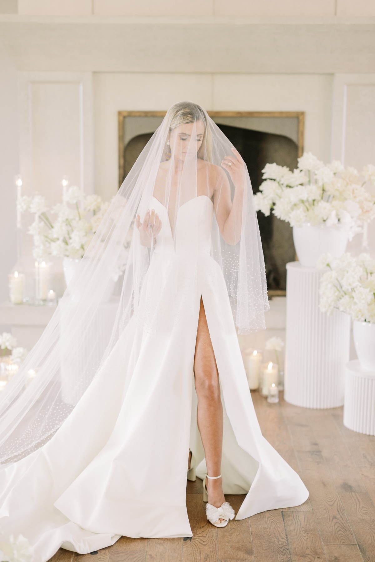 Sexy modern wedding dress with thigh slit and long veil