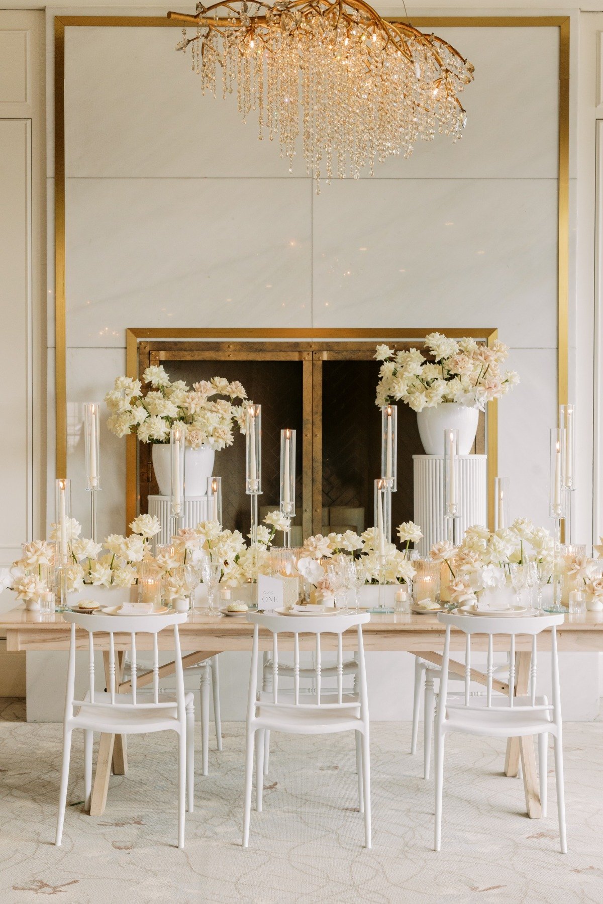 White rose filled modern wedding reception 
