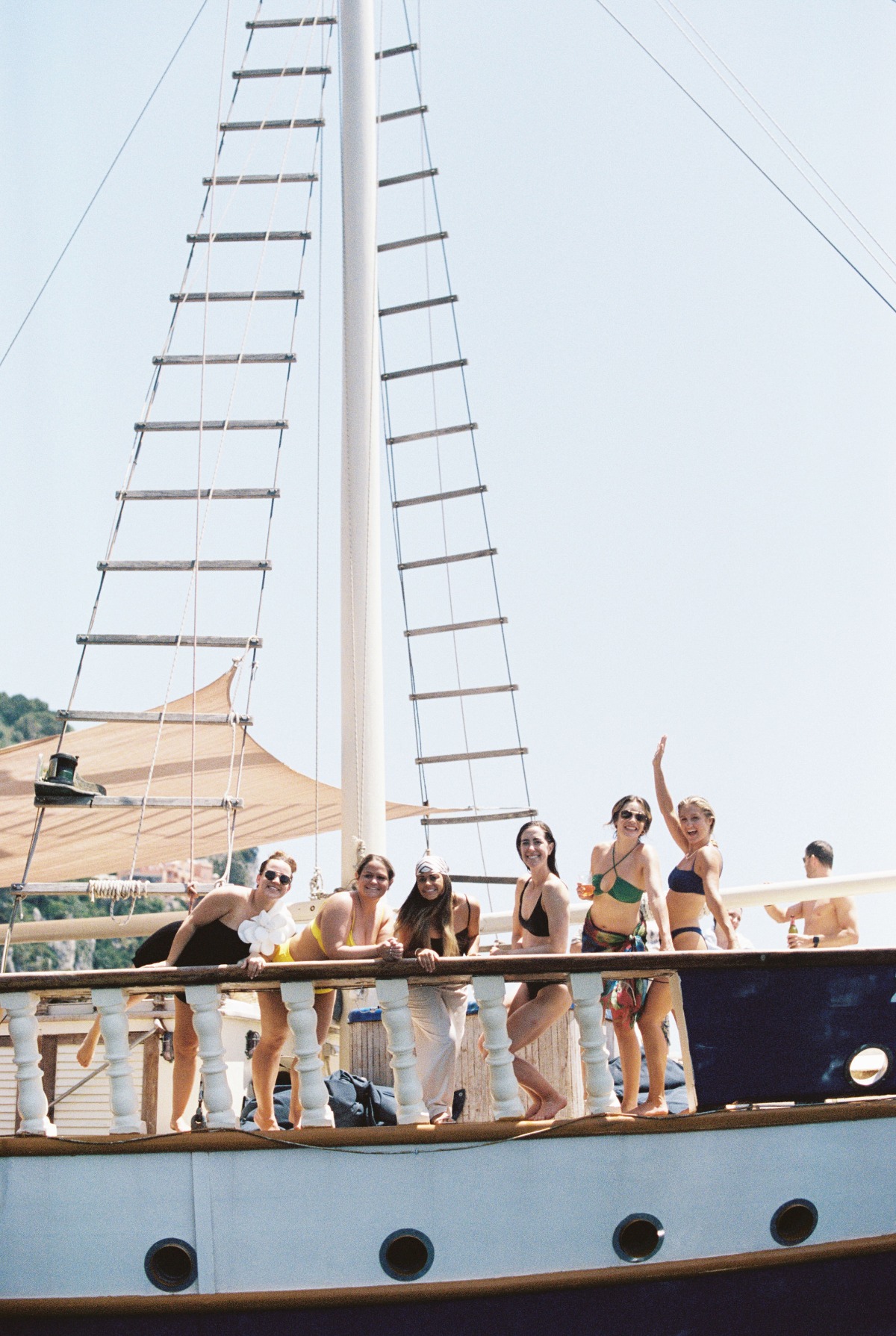 Wedding guests partying on a boat