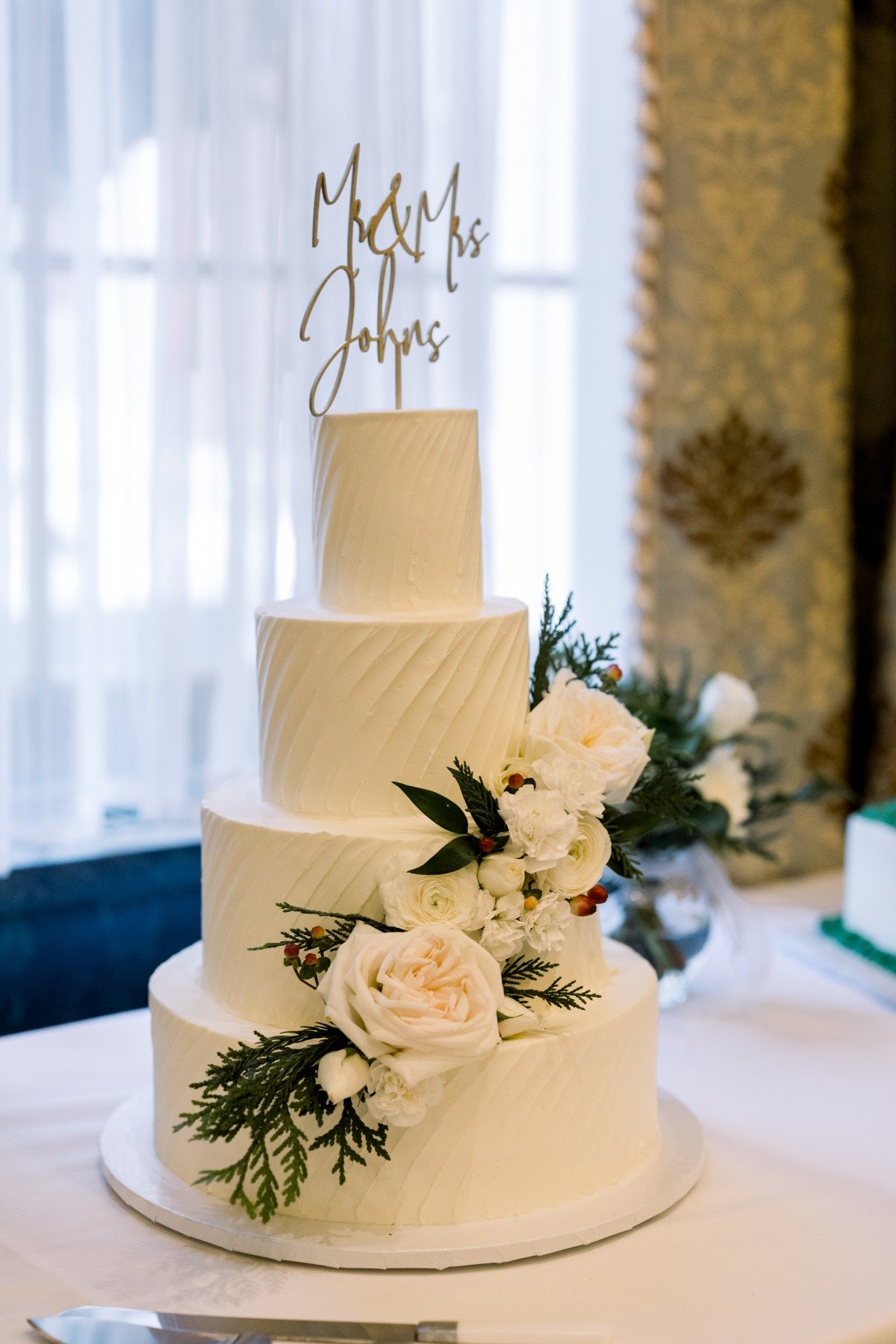 Classic white floral wedding cake 