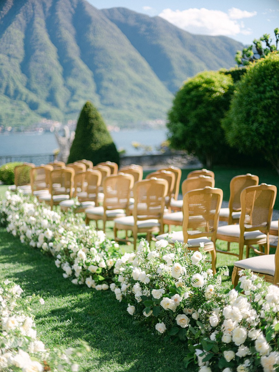 White and green aisle flowers
