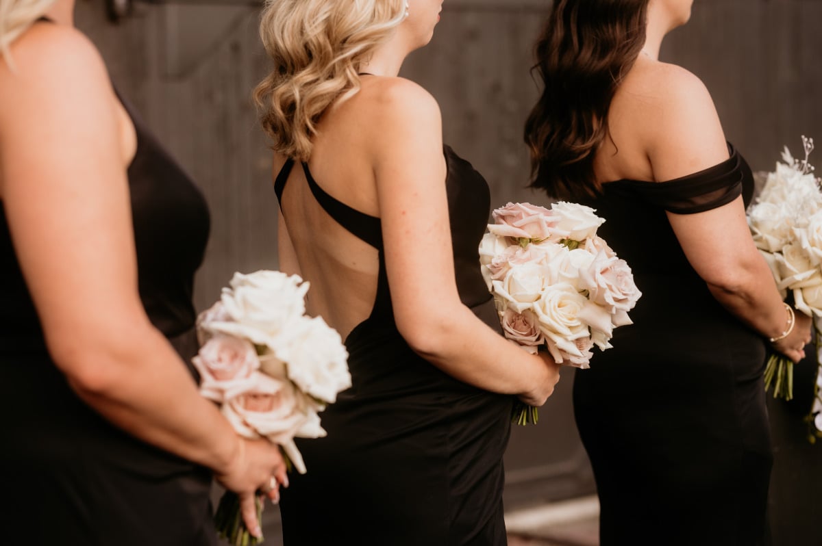 mauve and white rose bouquets for bridesmaids
