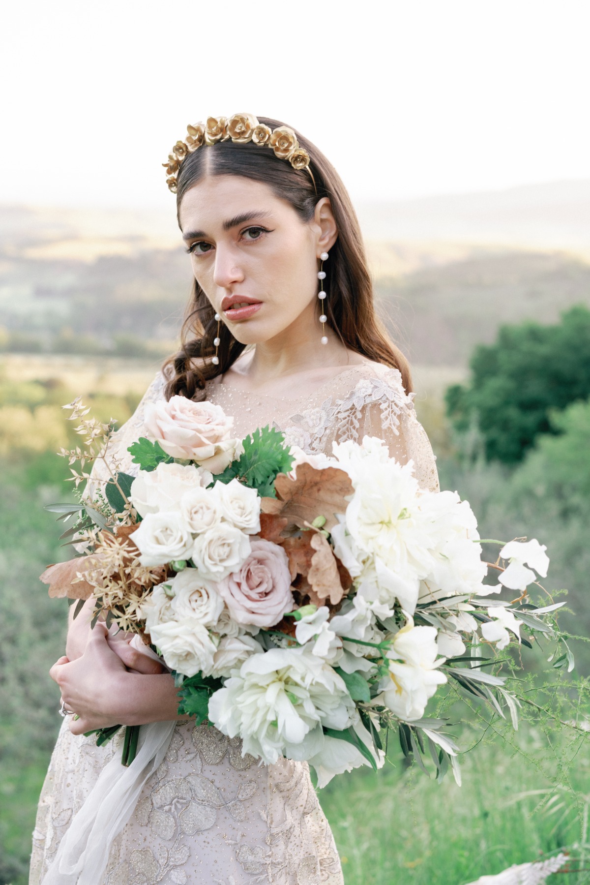 Ethereal gold headpiece to match dreamy couture wedding gown 