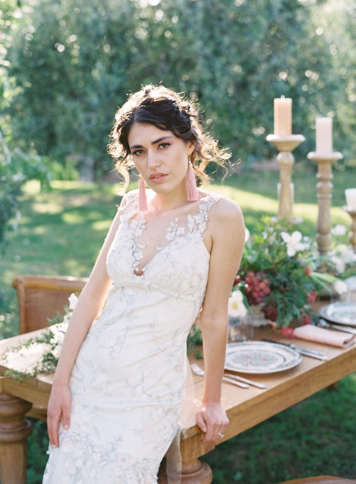 Romantic Italian bride at rustic chic reception table