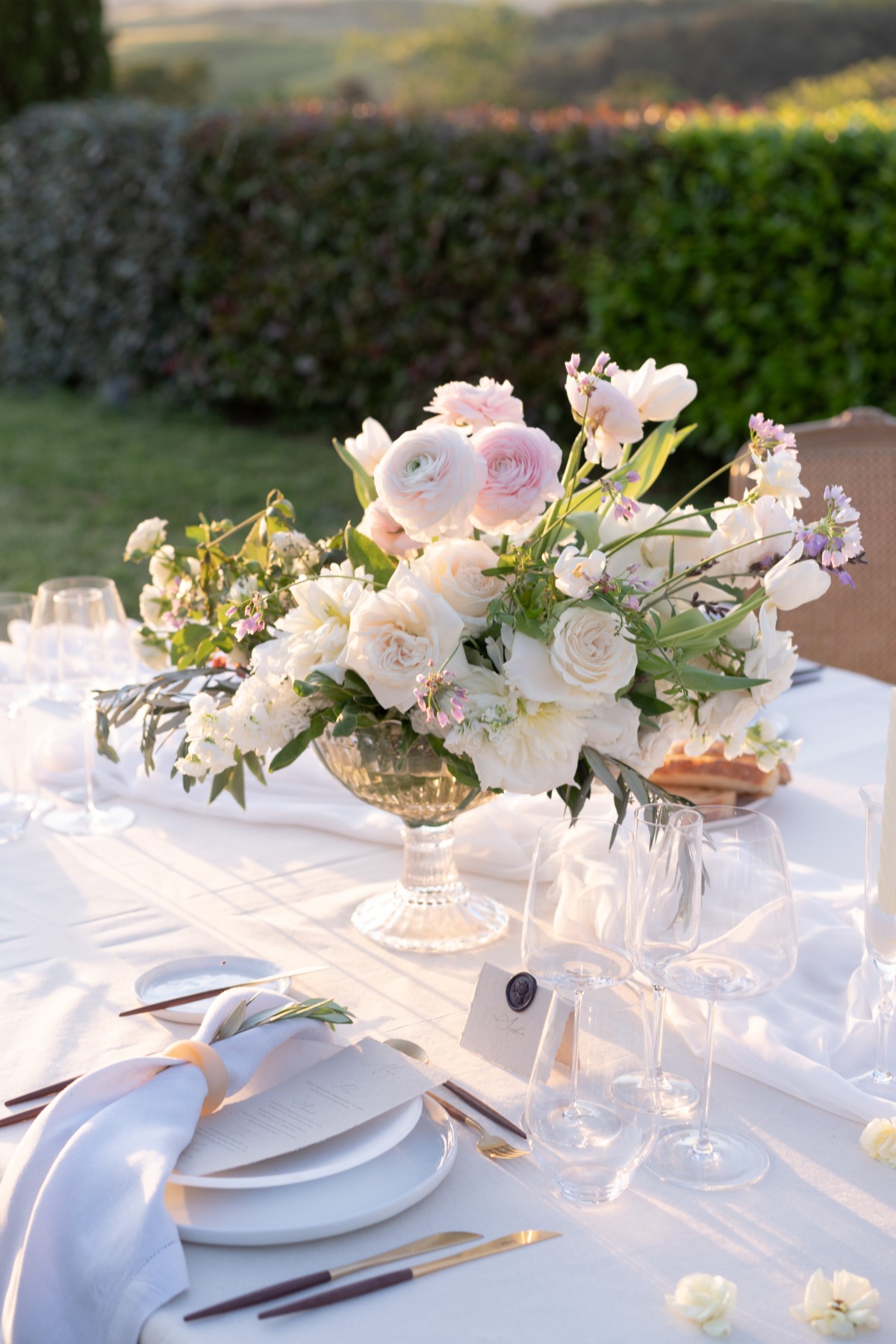 Lovely white and blush centerpiece for elegant reception 