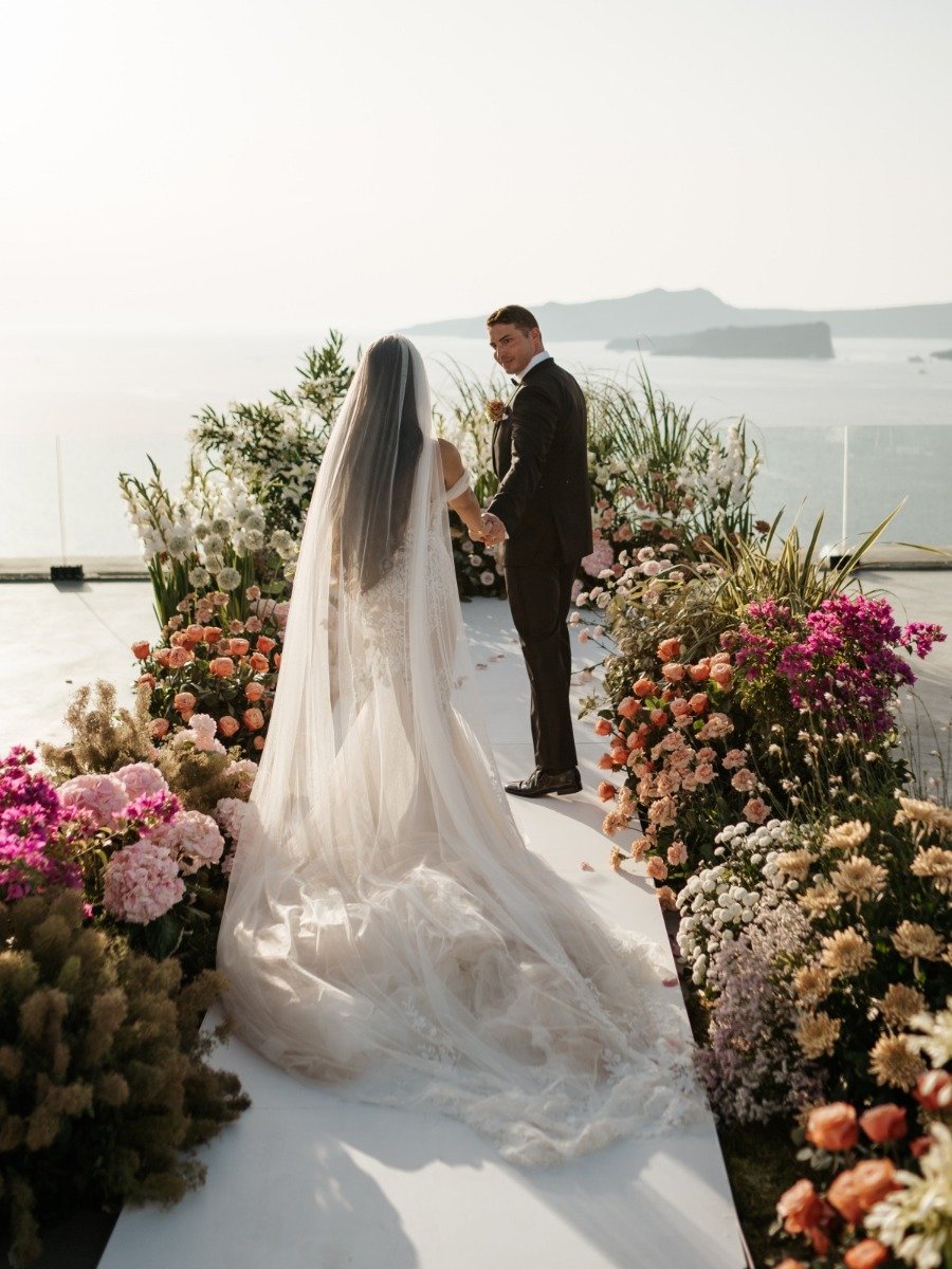 This couple created a wildflower meadow for their Santorini wedding