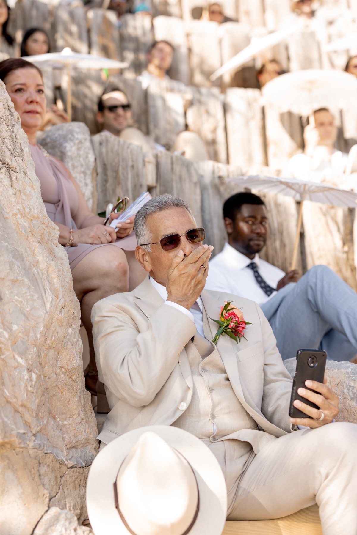 Father of the groom watching wedding ceremony in Ibiza