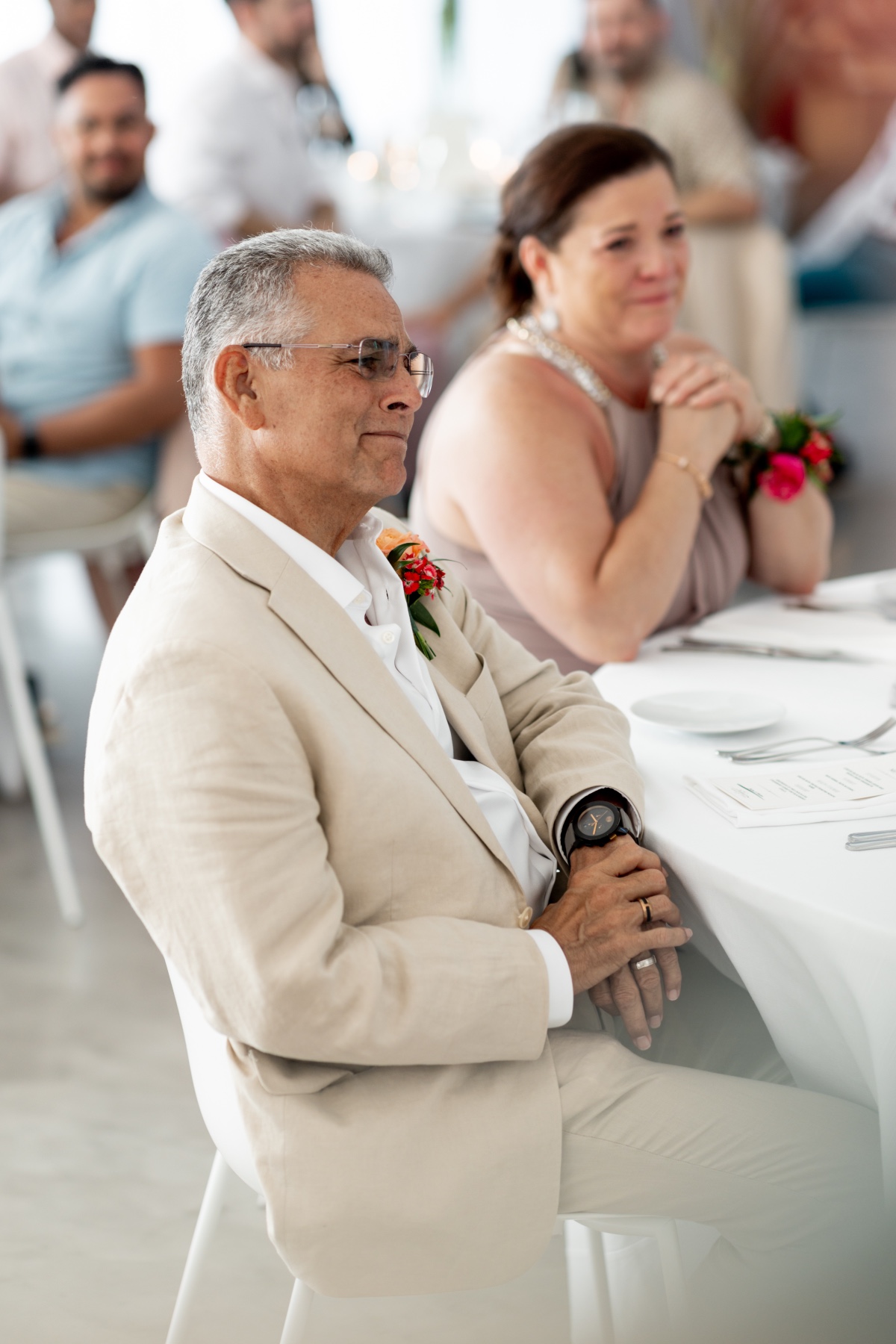 Emotional father of the groom listening to toasts and speeches