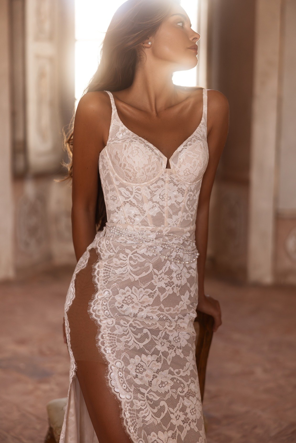 bra-top corset lace wedding dress with thigh high slit by Yedyna