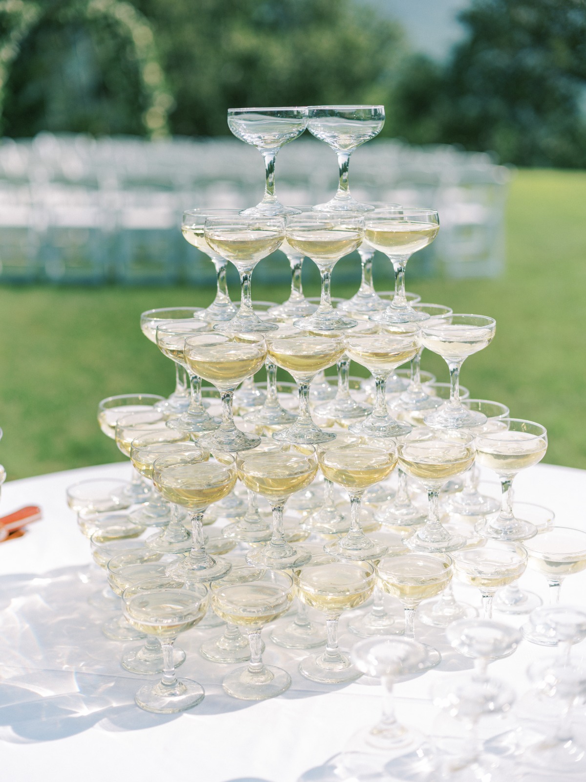 Modern simple champagne tower for post-ceremony toast 