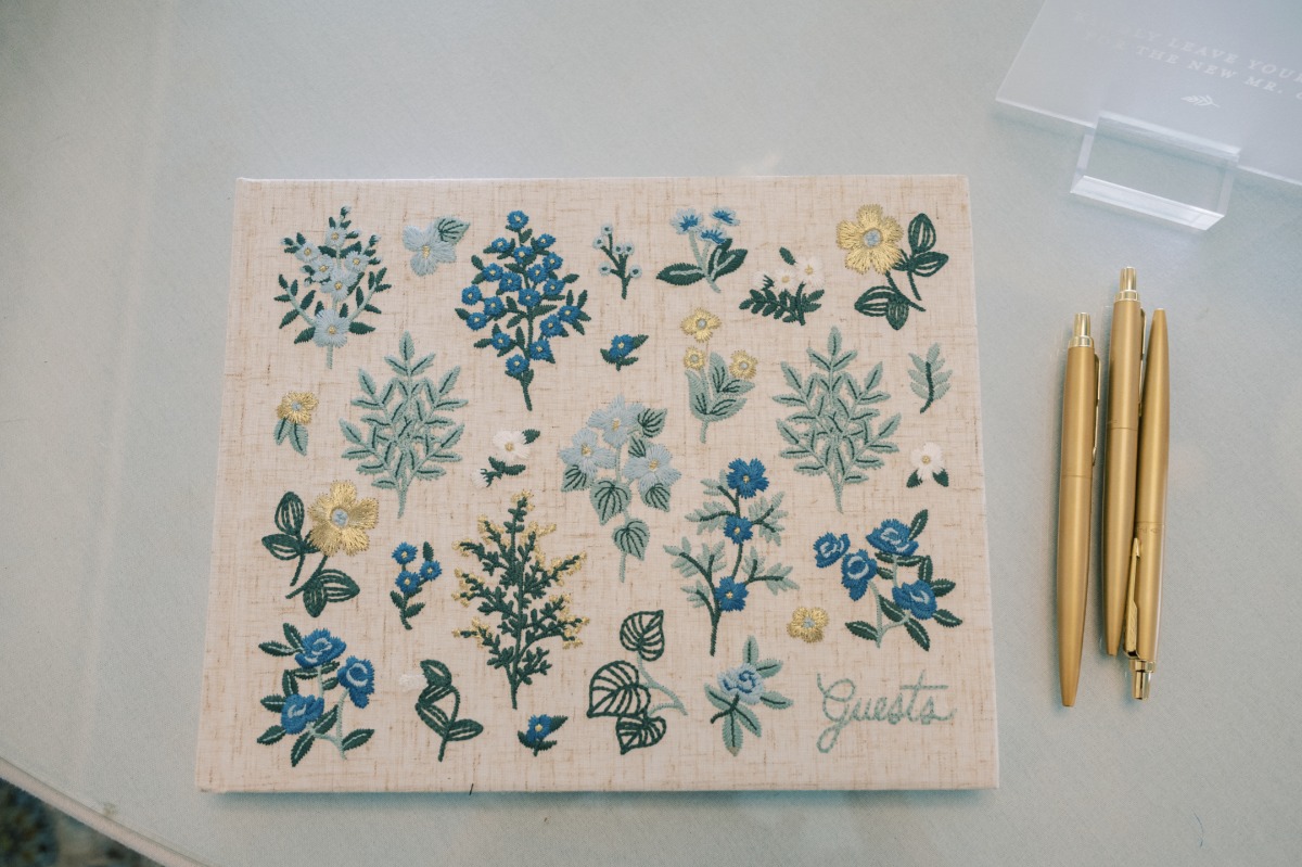 Boho blue wildflower welcome guest book with gold pens 