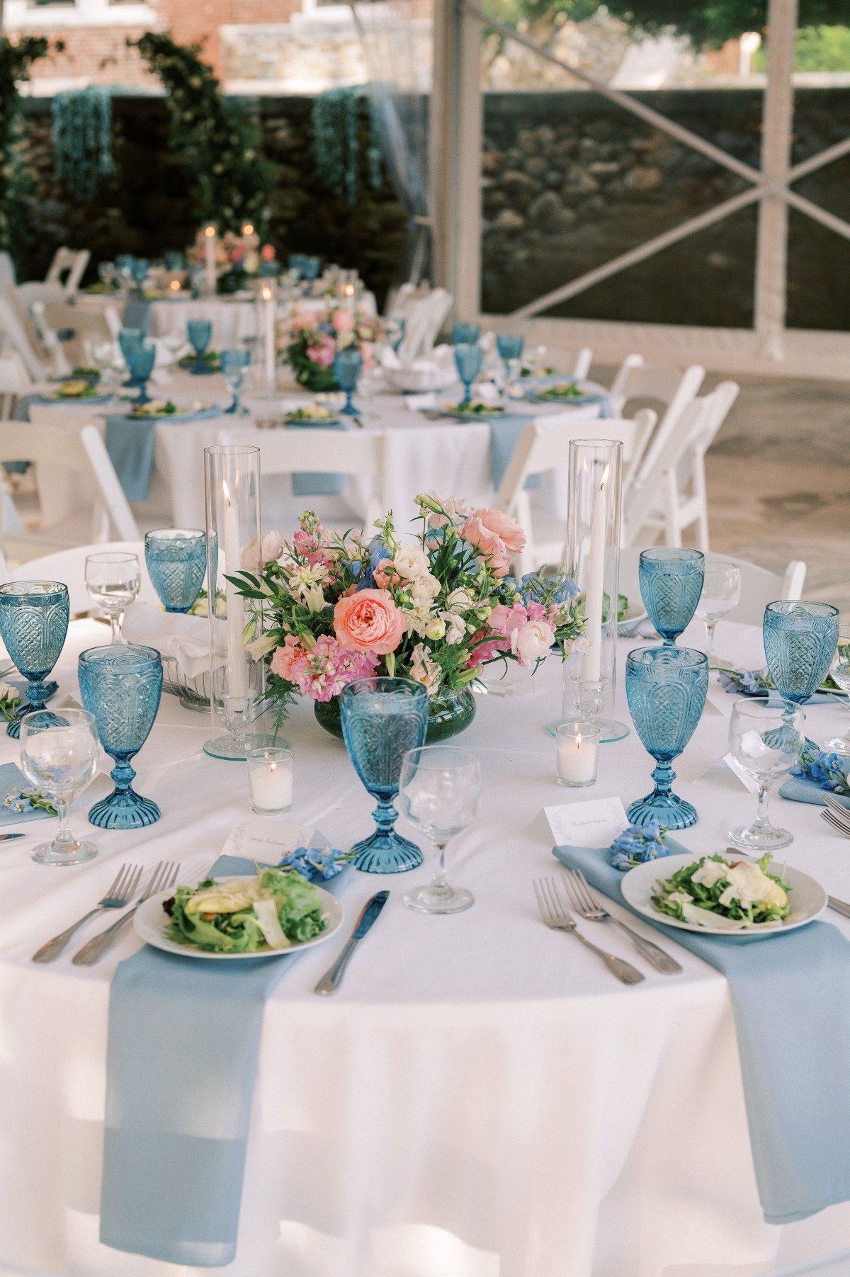 Elegant boho pink and blue reception decor and goblets 