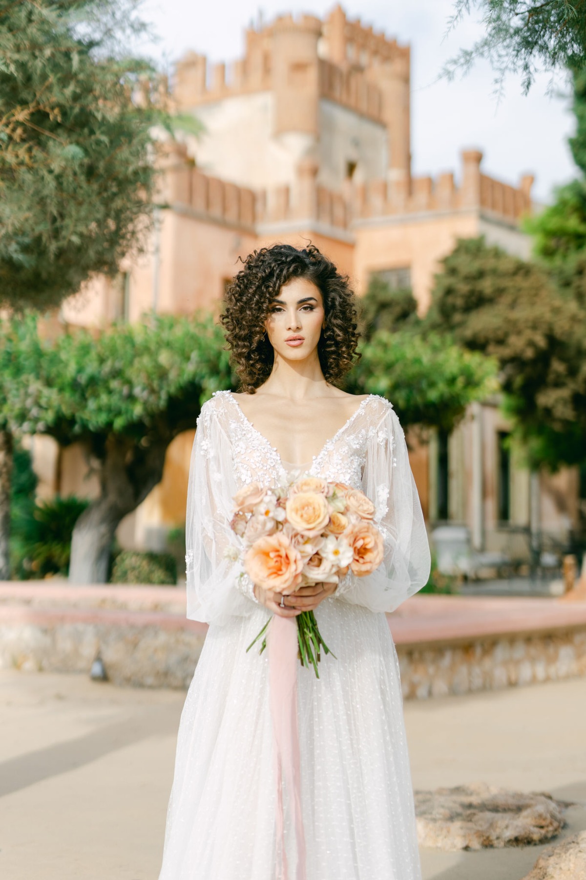 Romantic, billowing floral wedding gown at Greek wedding