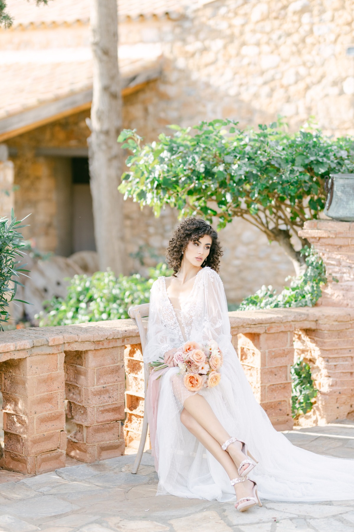 Dreamy Greek bride in textured floral wedding dress 