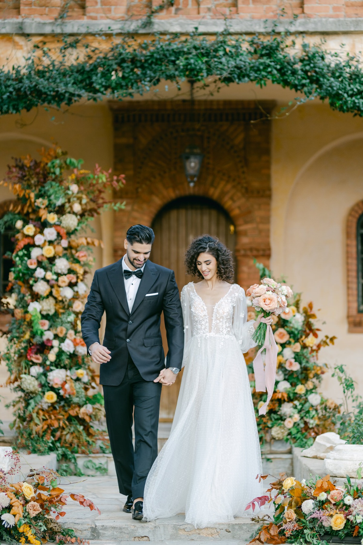 Dreamy newlyweds at autumn floral wedding in Greece