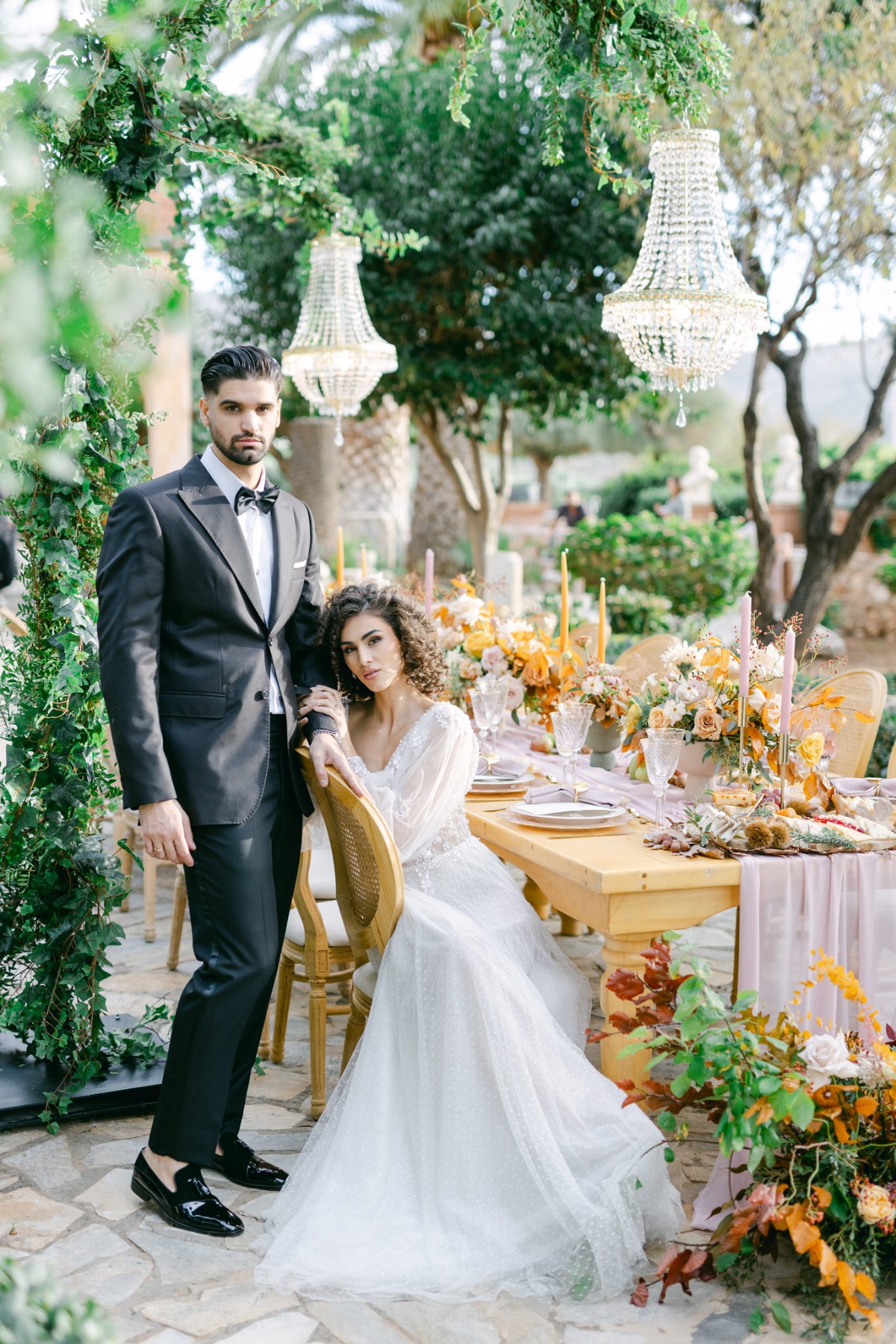 Greek bride and groom at luxury outdoor fall wedding 