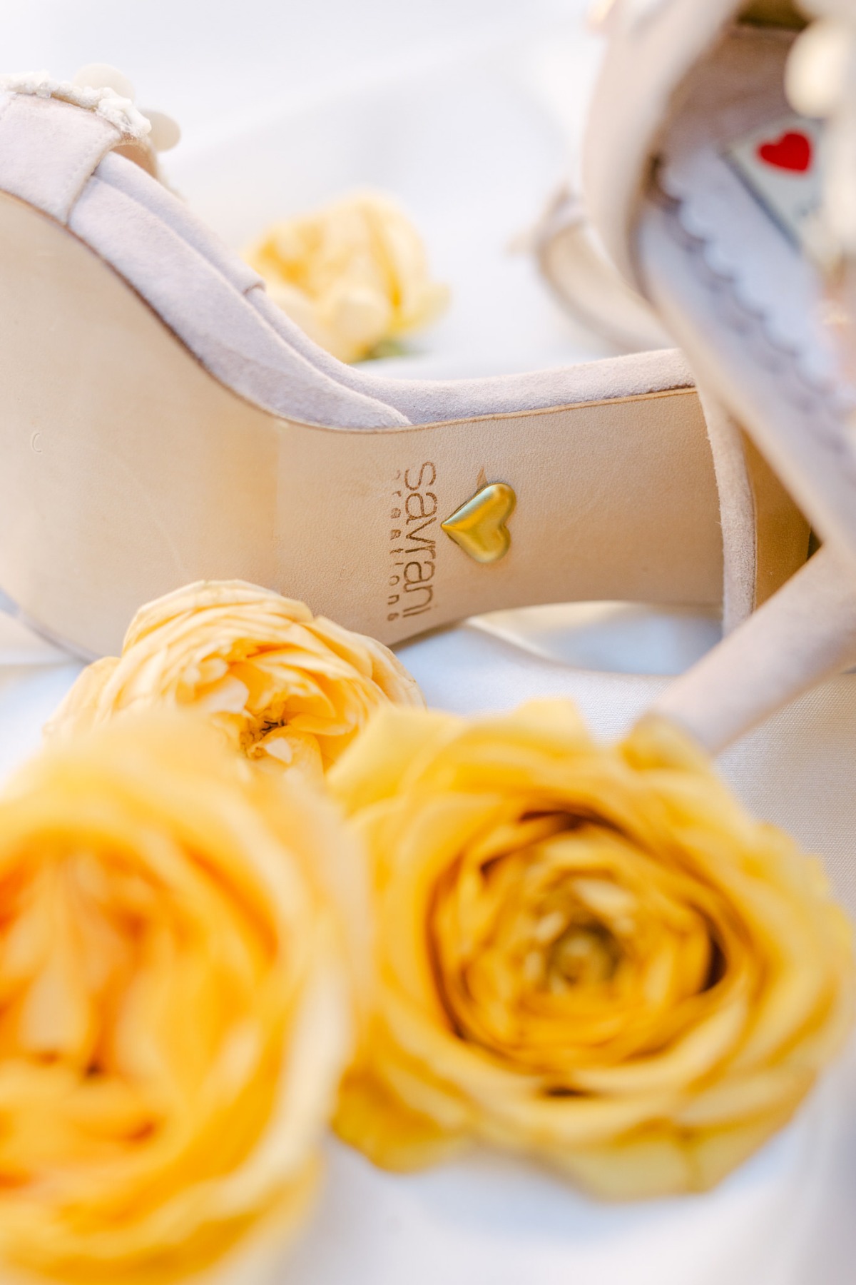 Cute gold heart emblem for bottom of wedding shoes 