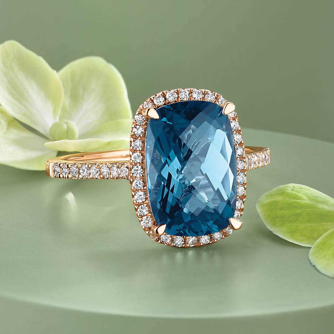 blue topaz halo engagement ring 