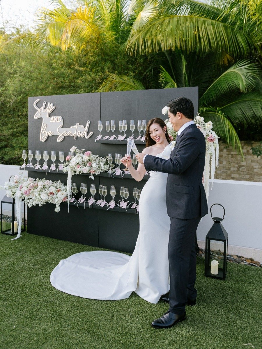 Say cheers to this luxe Phuket wedding with a champagne seating wall