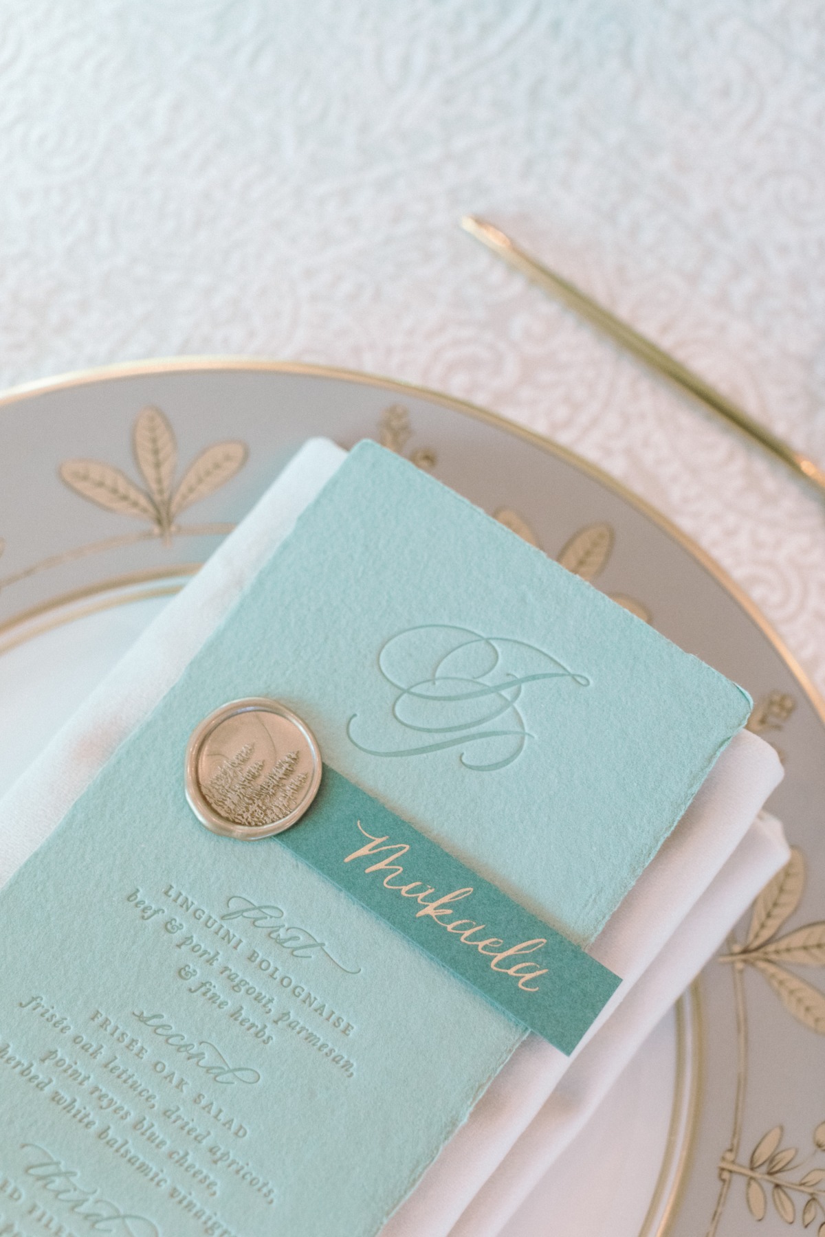 Green and gold custom wedding menus with wax seal 