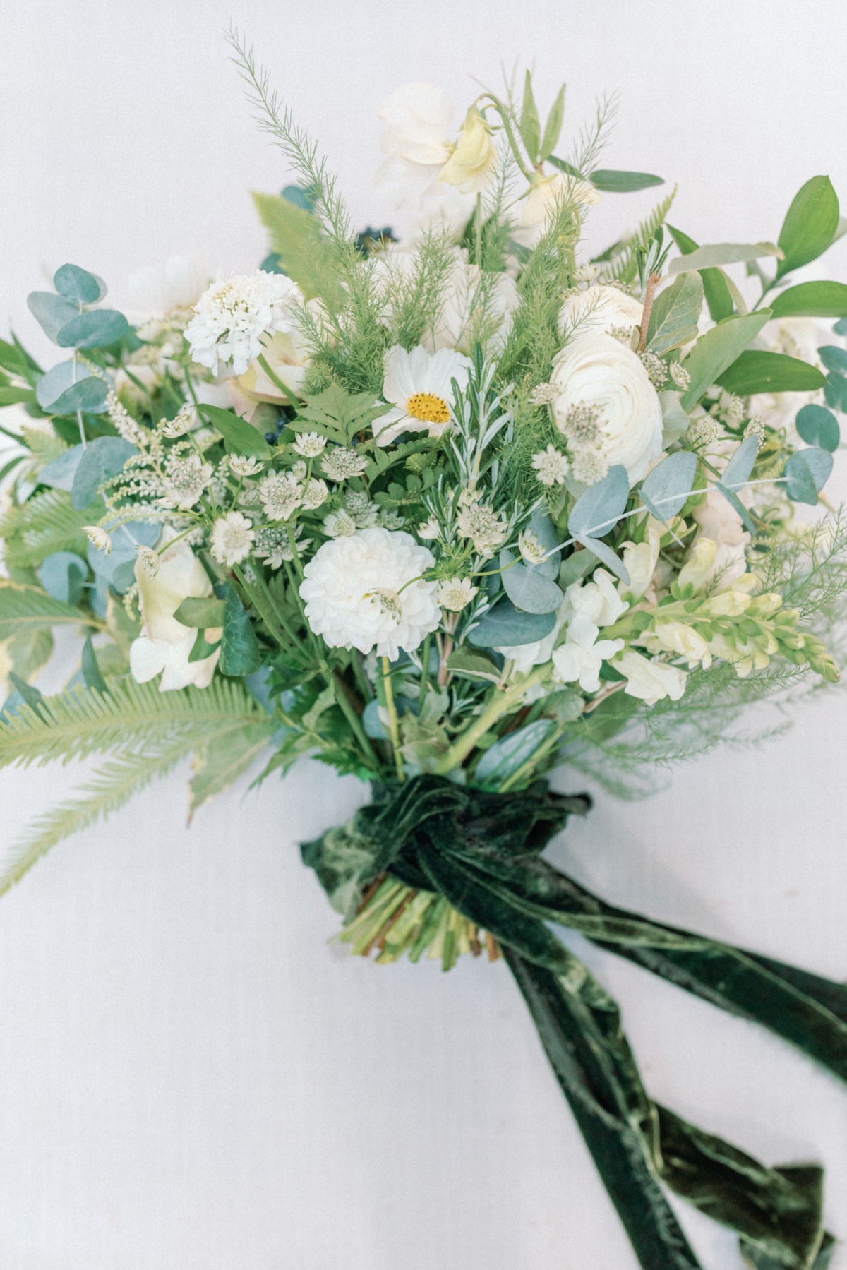 White and green wedding bouquet with velvet ribbon 