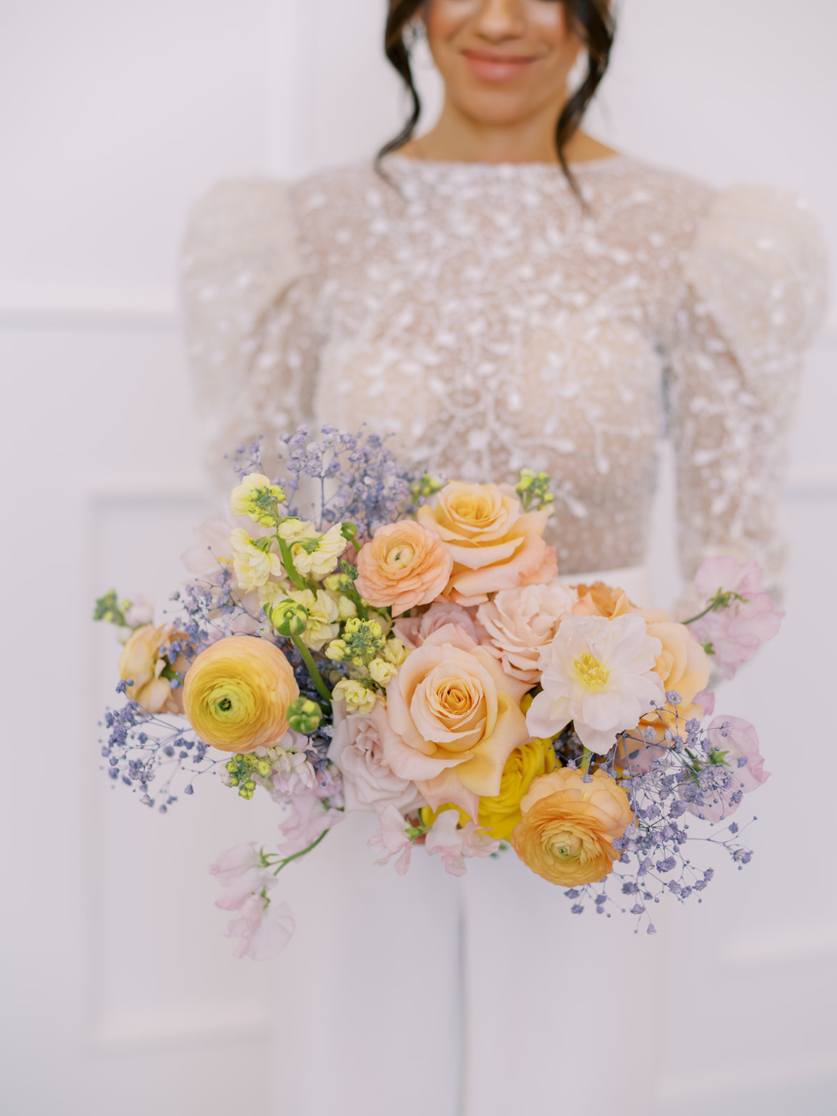 purple and yellow bridal bouquet