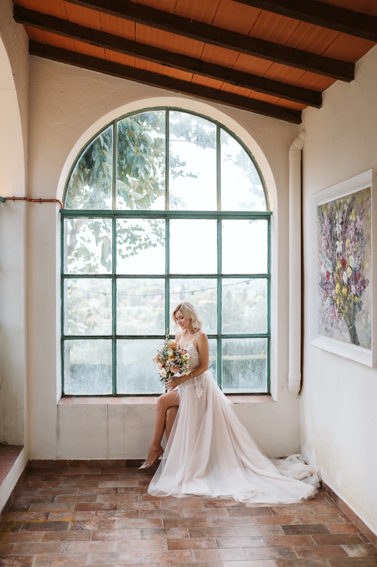 bride posing with pastel bouquet
