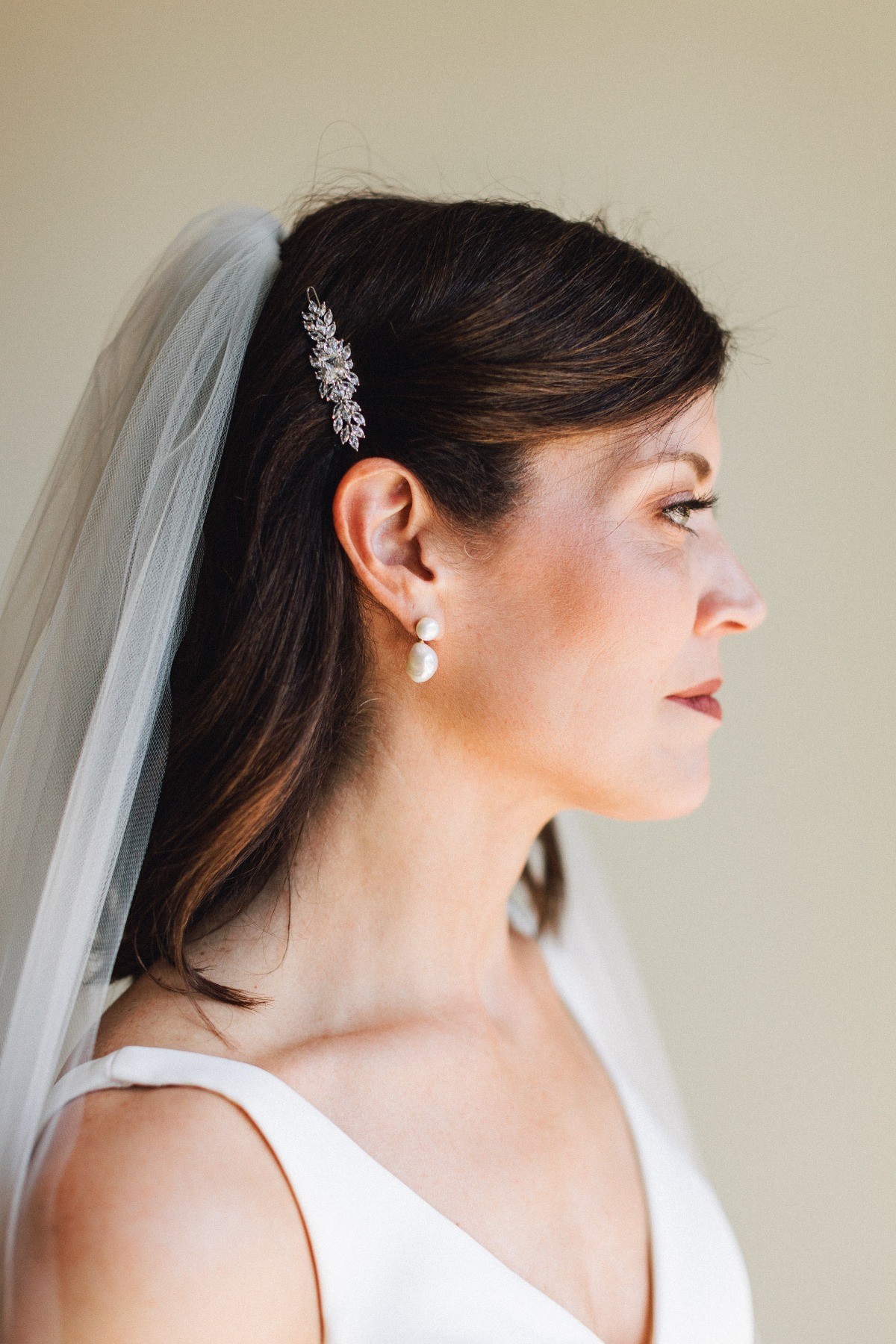 Timeless bridal makeup with pearl accessories 
