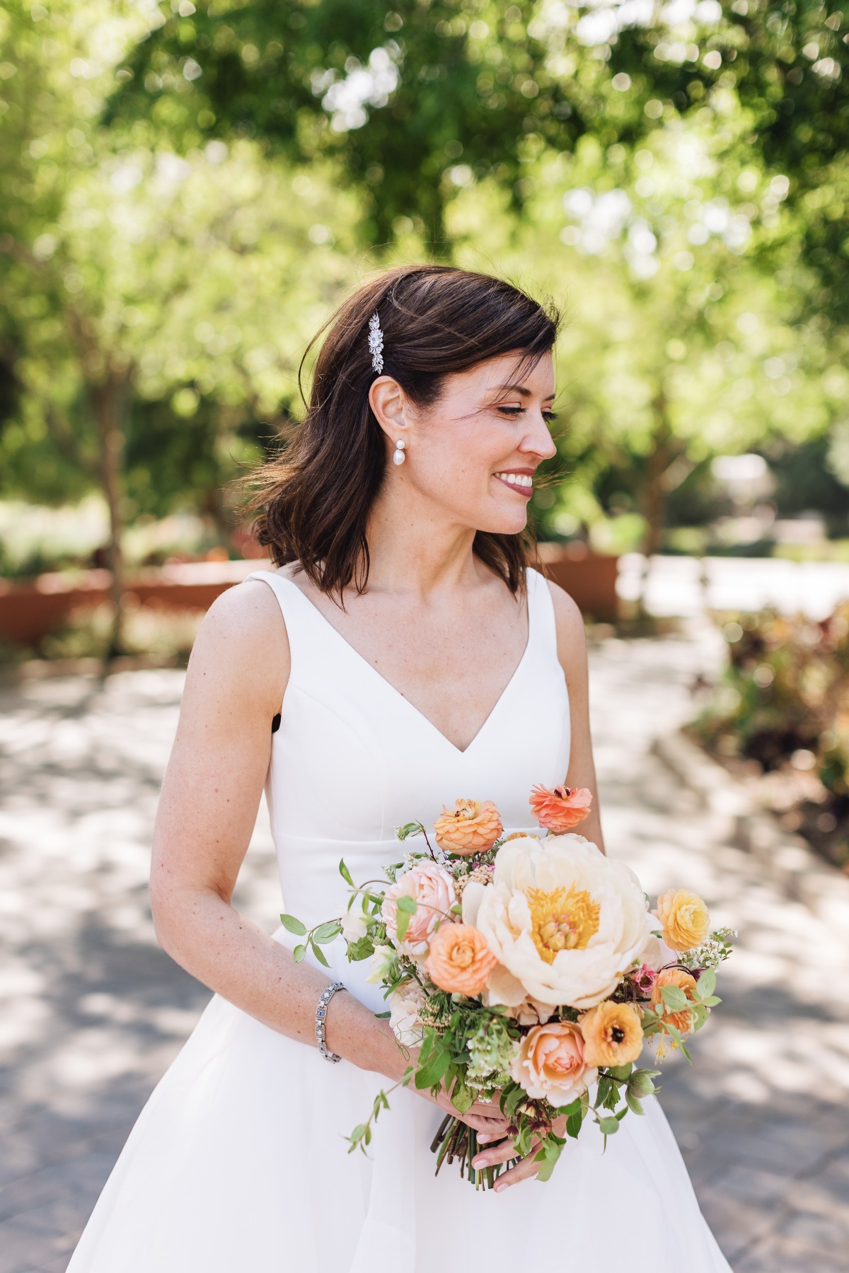 Luscious and bountiful peach palette bridal bouquet 