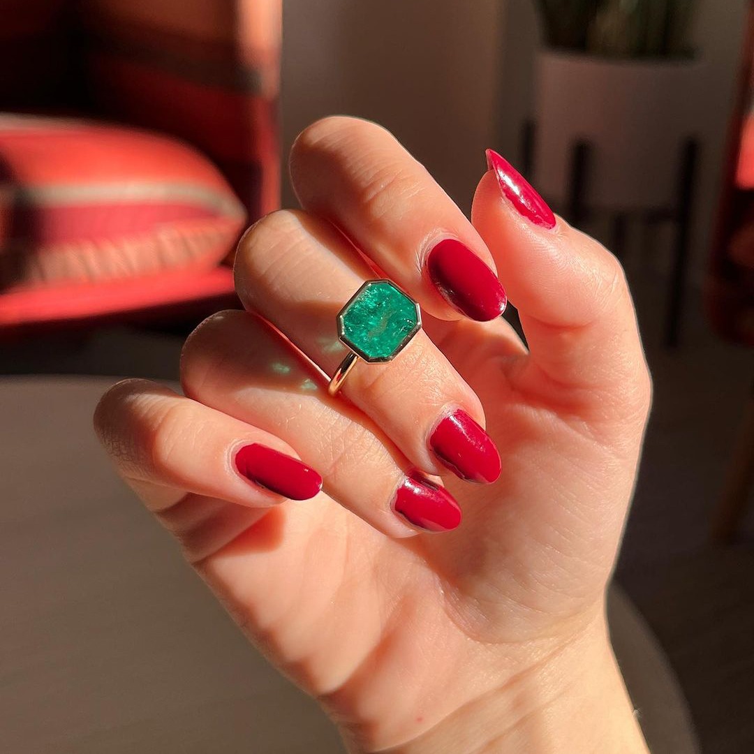 bezel -set emerald engagement ring