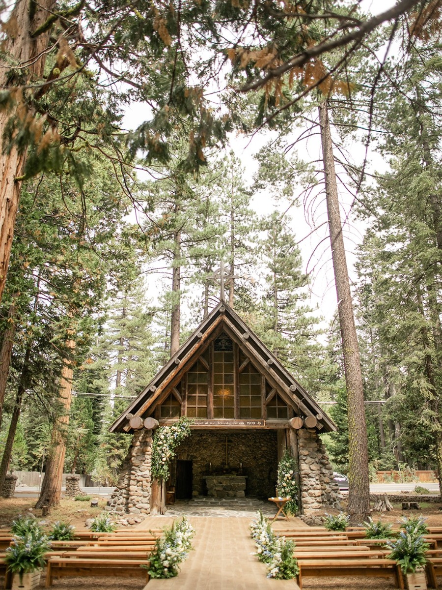 Intimate woodland chapel wedding in shades of blue and white