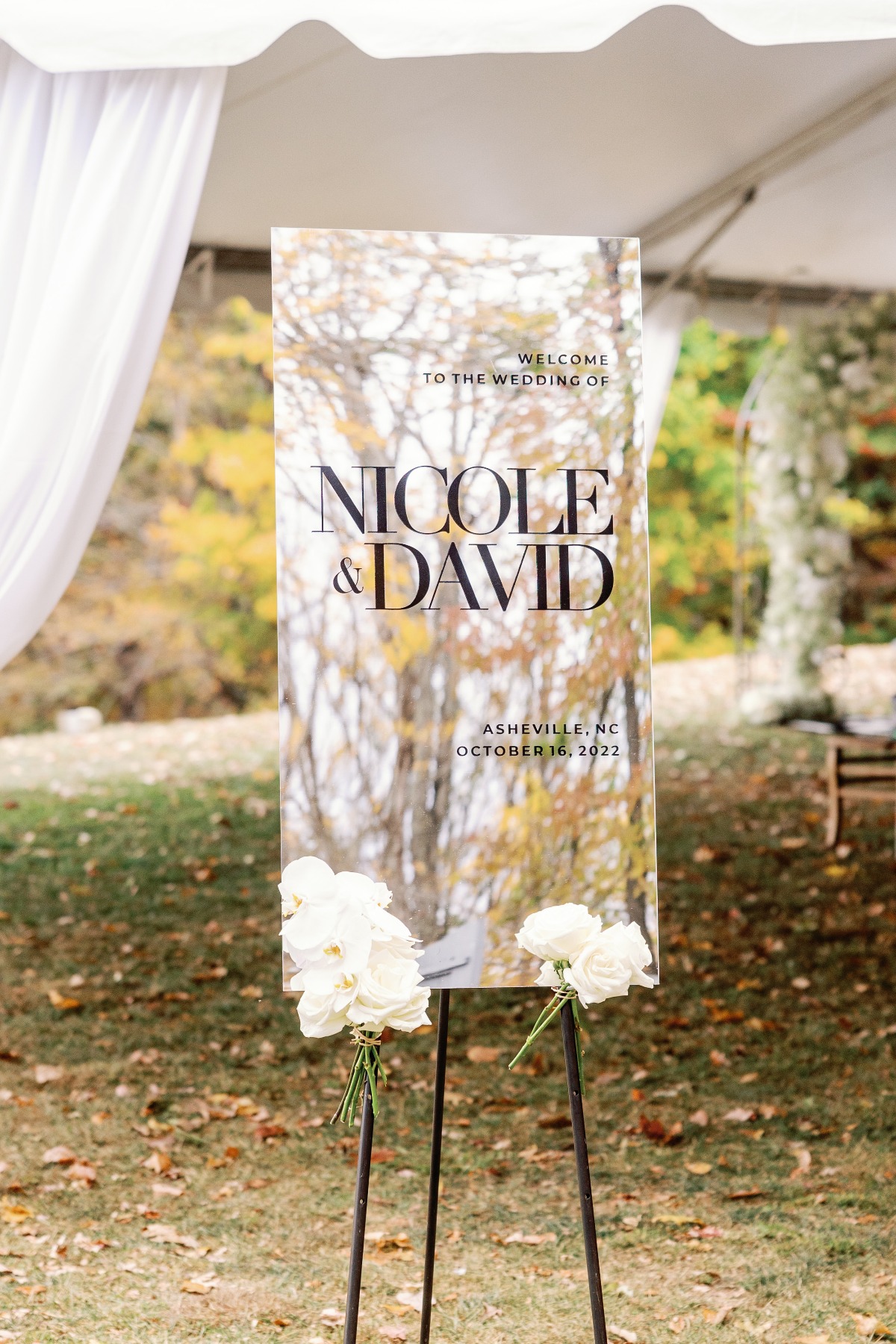 Mirrored modern wedding welcome sign with black text 