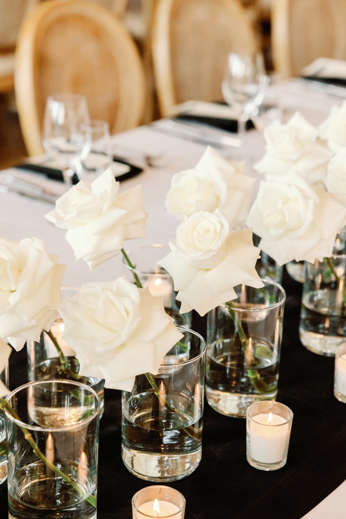 Single stem white rose centerpieces for modern wedding 