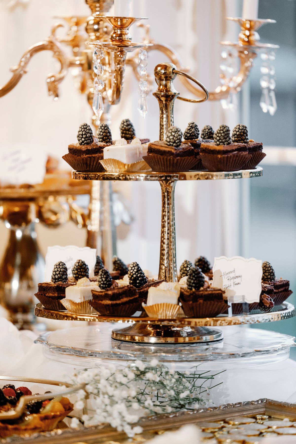 Ornate wedding dessert bar for luxury wedding reception