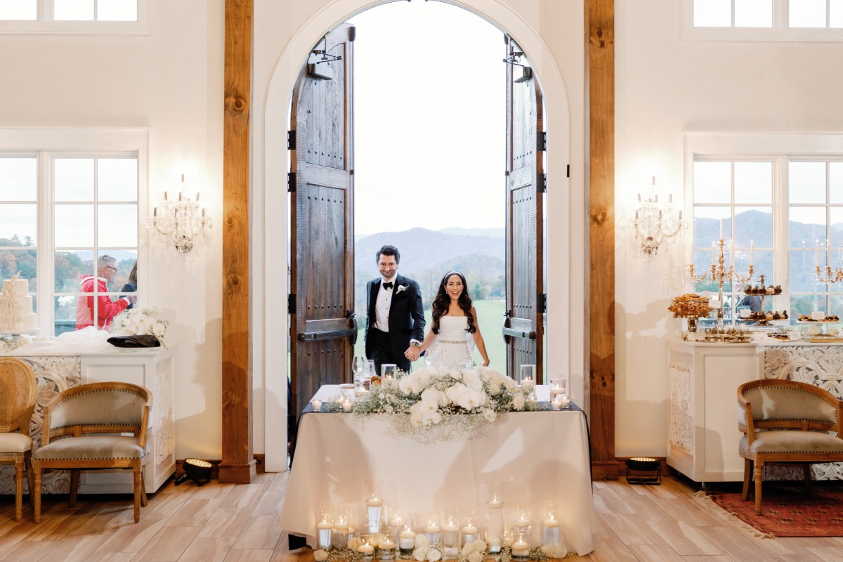 Bride and groom room reveal of modern luxury wedding reception 