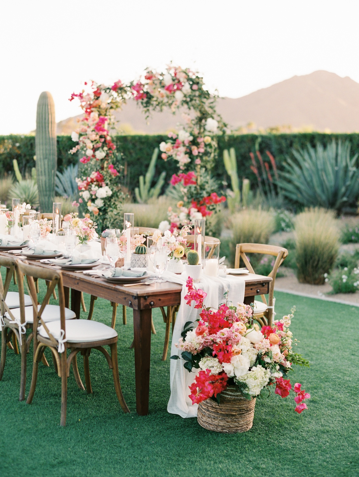 Dreamy pink floral wedding reception in the Arizona desert