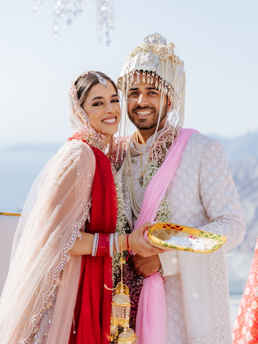 A bright and colorful 3-day luxury Indian wedding in Santorini