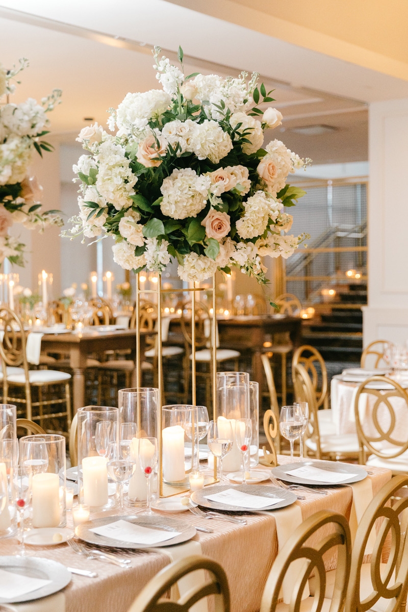tall gold stands for wedding centerpieces