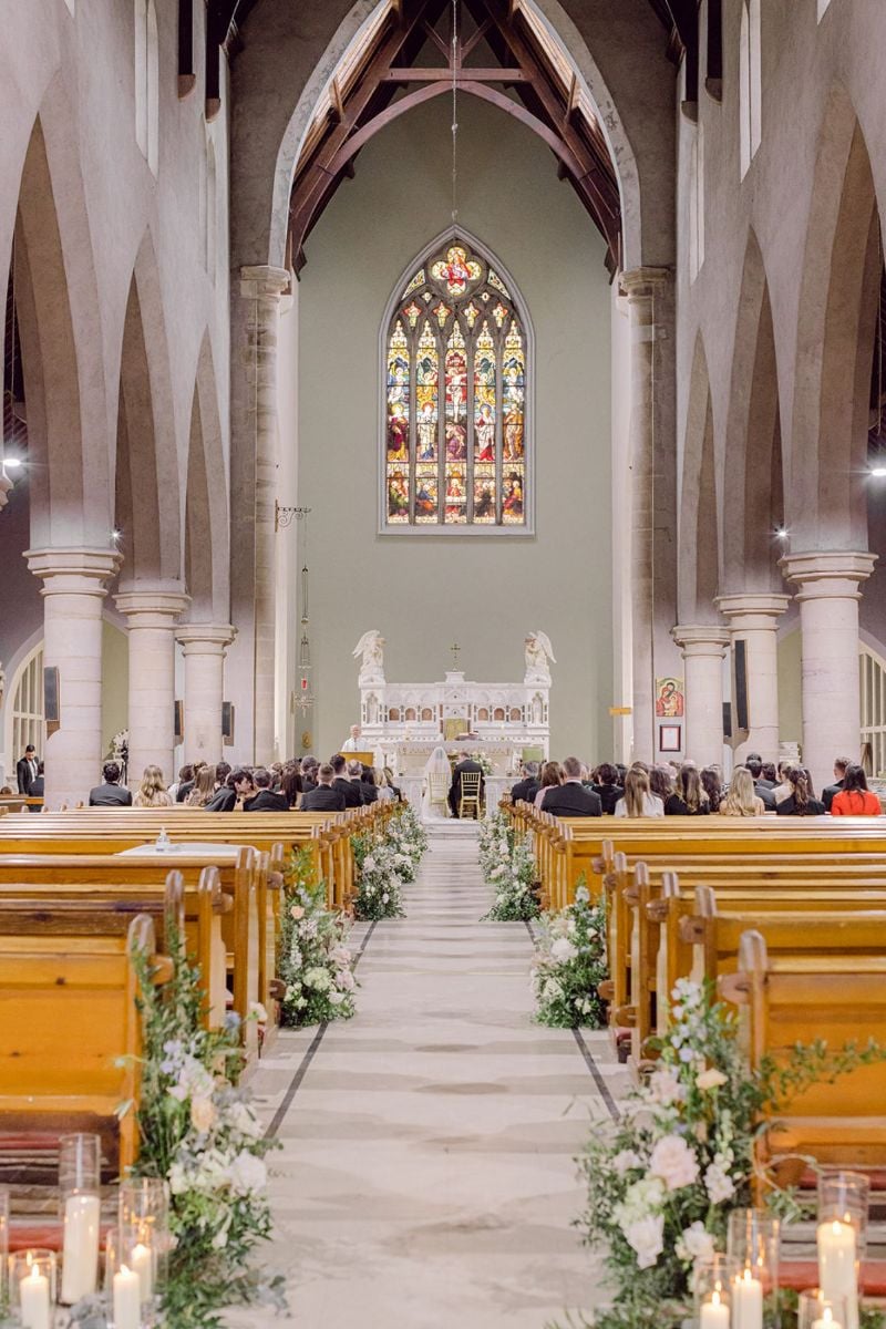large white and green ceremony aisle arrangements
