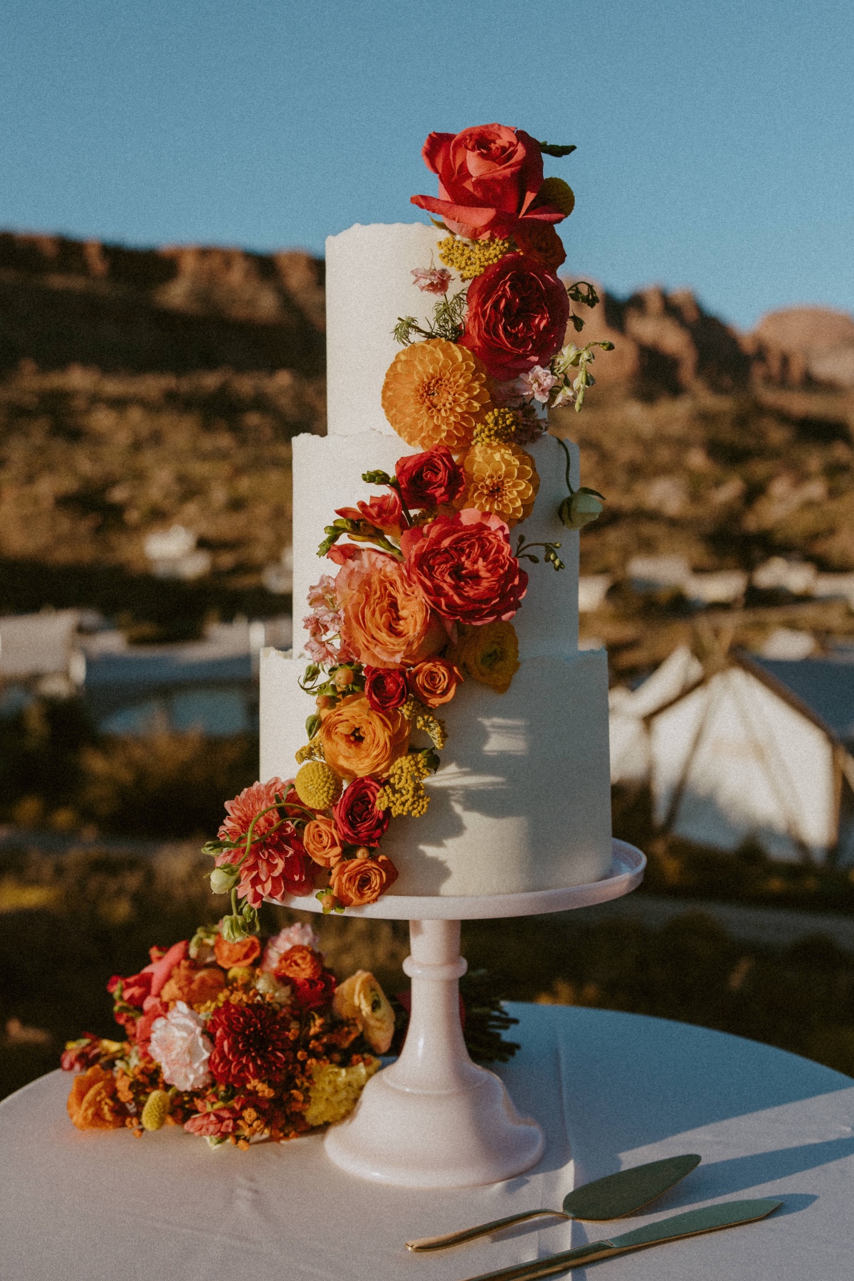 bright red and orange flowers for wedding cake 