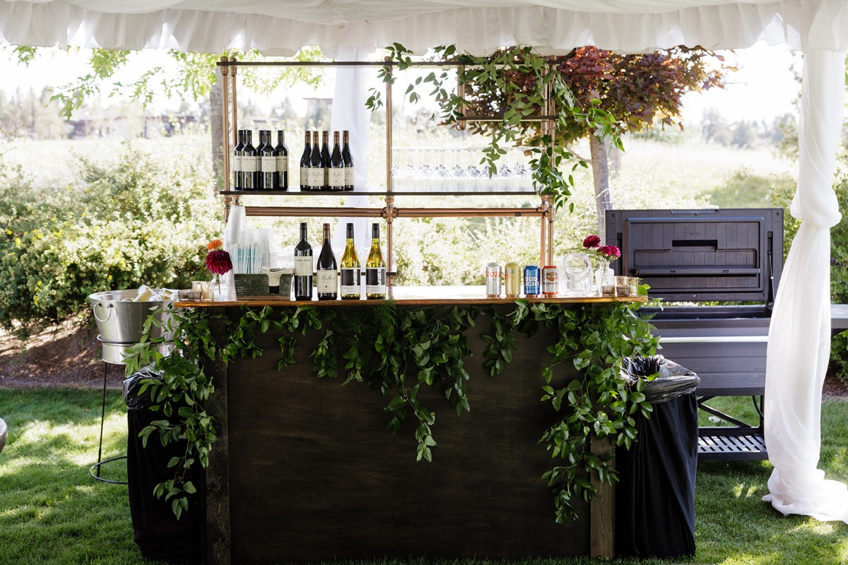 wedding bar with greenery